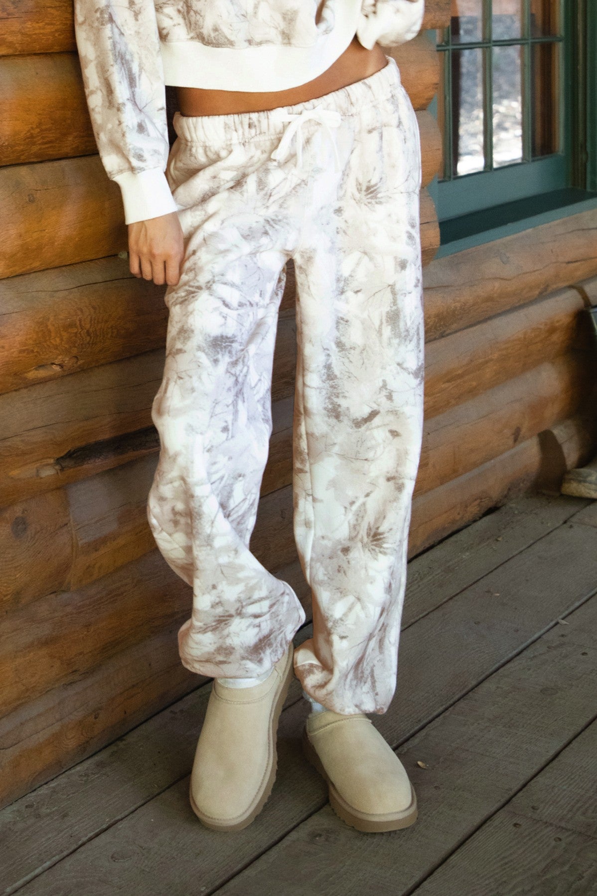 TIC TOC AVERY Woodland Camo Fleece Sweatpants with self-tie waistband, elastic cuffs, and soft Cloud Fleece fabric.