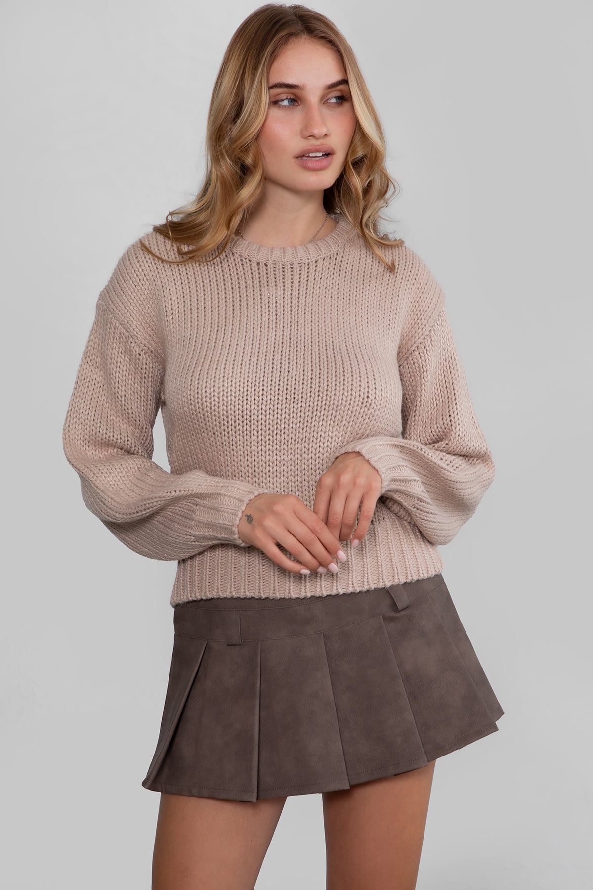 Model wearing TIC TOC KELLY Ribbed Knit Sweater Styled fall outfit with pu leather mini skirt