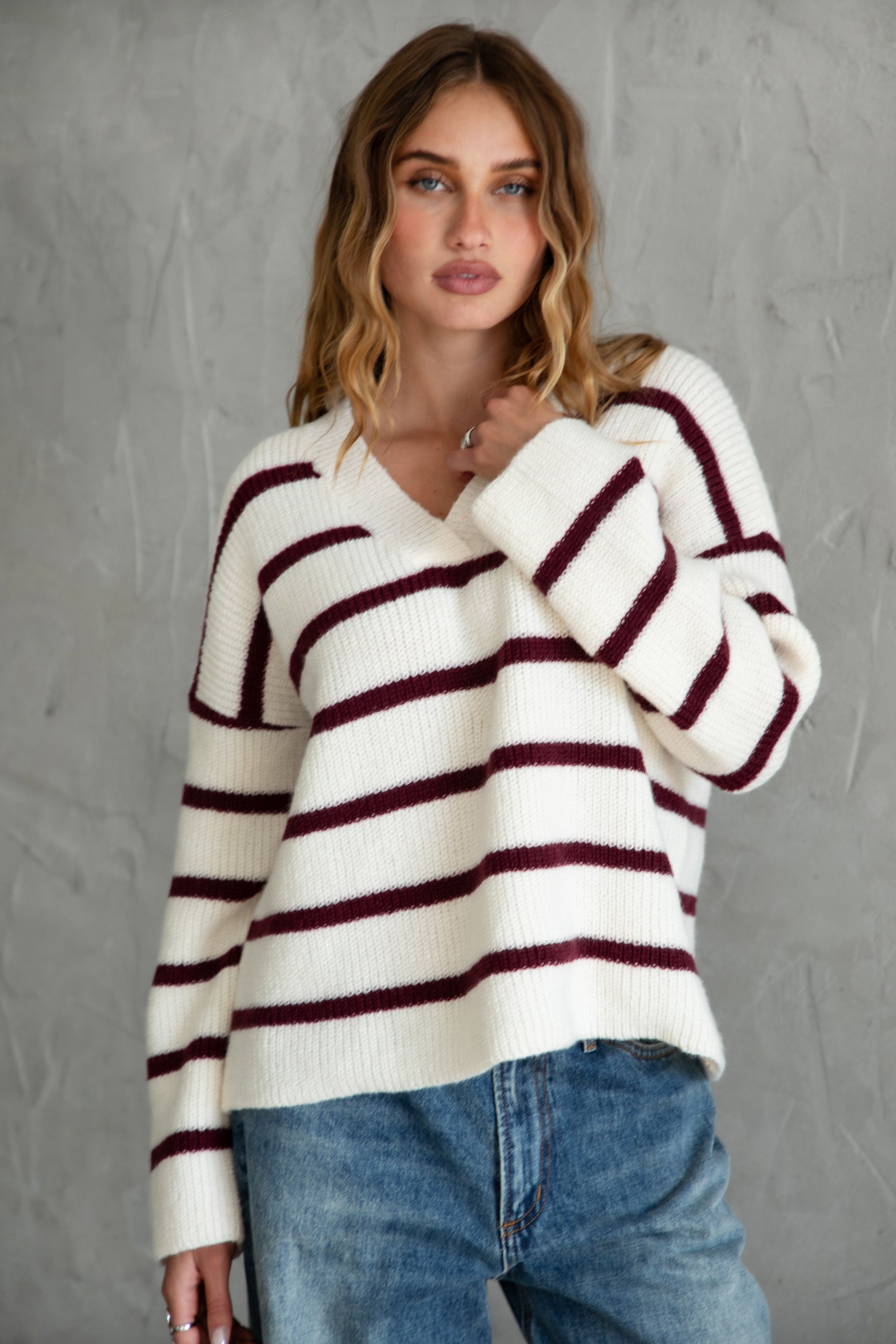 TIC TOC GENIVA Striped Sweater Cardigan front view low V neckline and burgundy stripe detail.