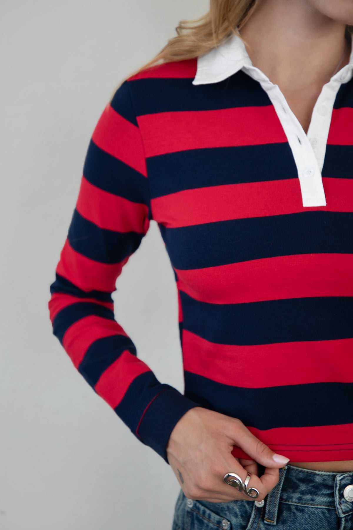 Woman wearing TIC TOC TOMMY Rugby Striped Long Sleeve Shirt in red navy showing the fabric detail