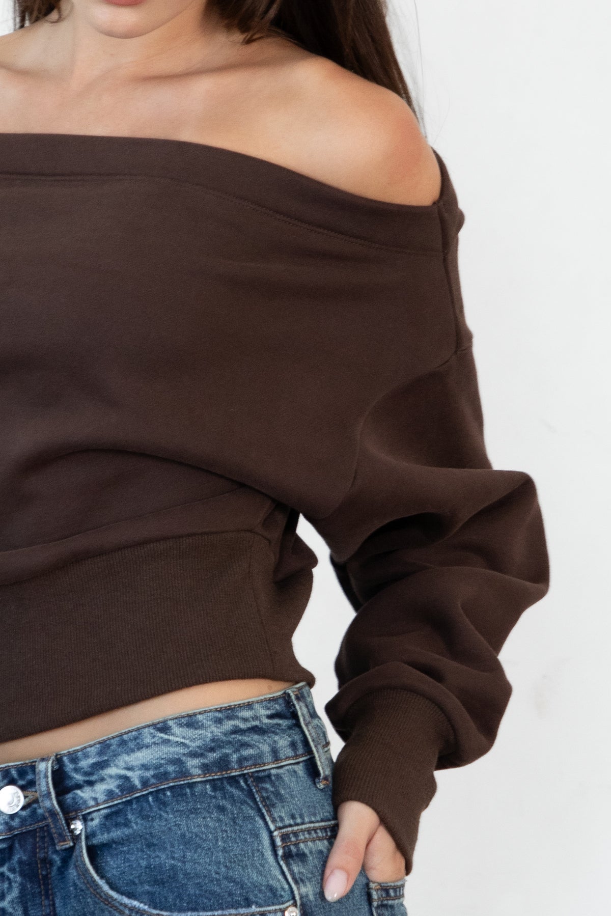 Woman wearing LANI mock neck cloud fleece sweatshirt featuring soft cotton blend cloud fleece fabric, ribbed mock neckline, relaxed oversized fit, dropped shoulder design, long sleeves with ribbed cuffs, triangle stitch detail at center front, and ribbed hem for a cozy comfortable finish.