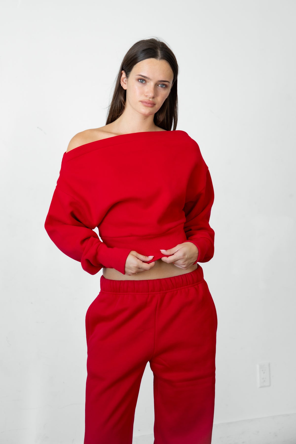 Woman wearing LANI mock neck cloud fleece sweatshirt featuring soft cotton blend cloud fleece fabric, ribbed mock neckline, relaxed oversized fit, dropped shoulder design, long sleeves with ribbed cuffs, triangle stitch detail at center front, and ribbed hem for a cozy comfortable finish.